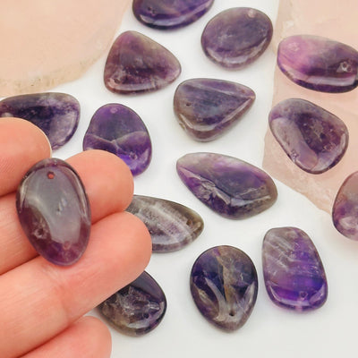 Chevron Amethyst Crystal Polished Bead - Double Drilled - in hand for size reference 