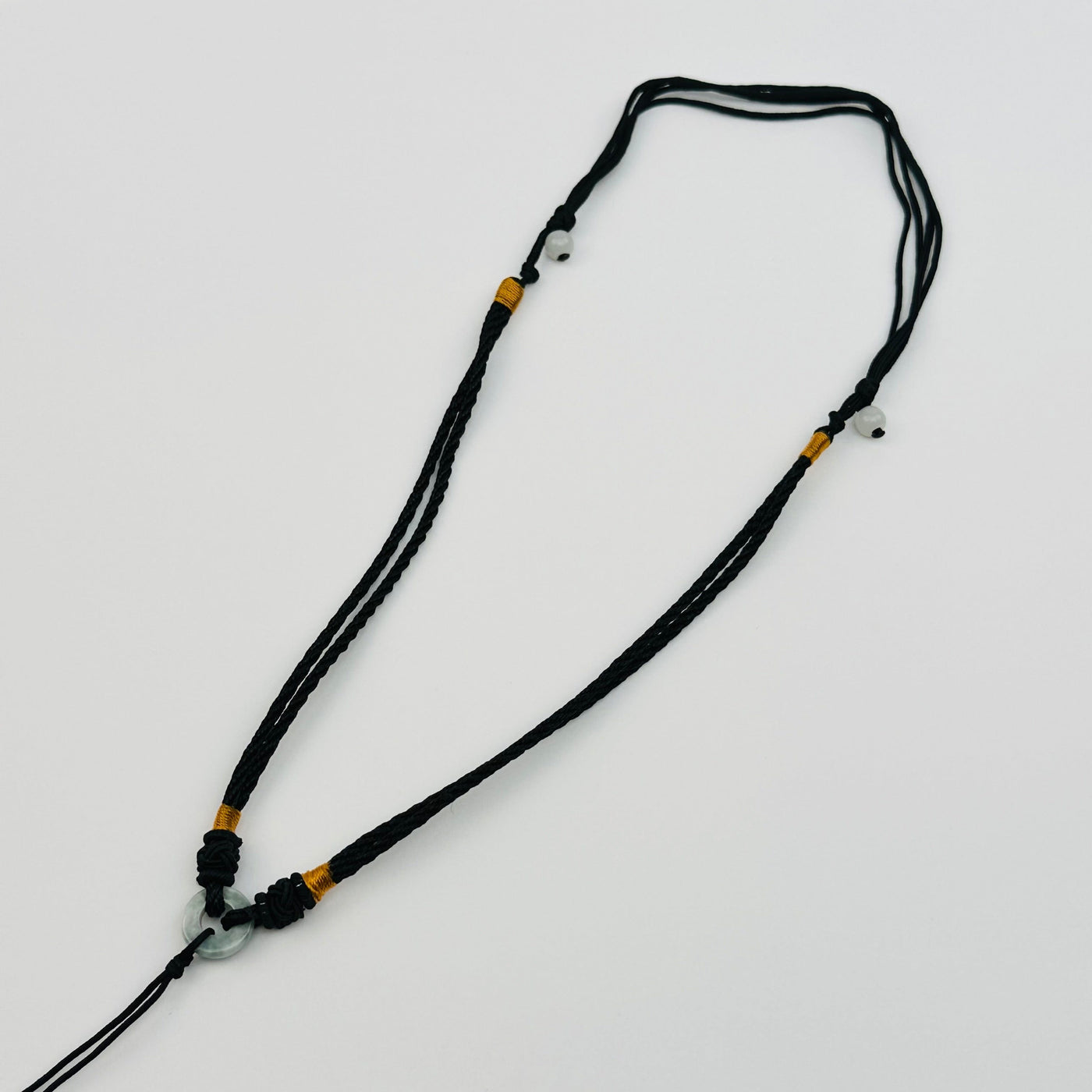 necklace displayed to show that it can be adjusted in size 