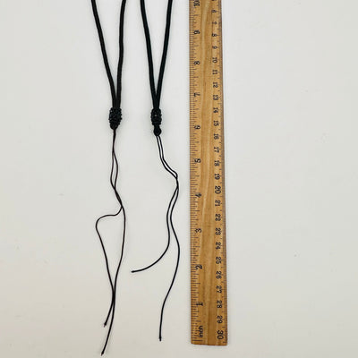 close up of the bottom of the necklace where you can add a personal pendant 