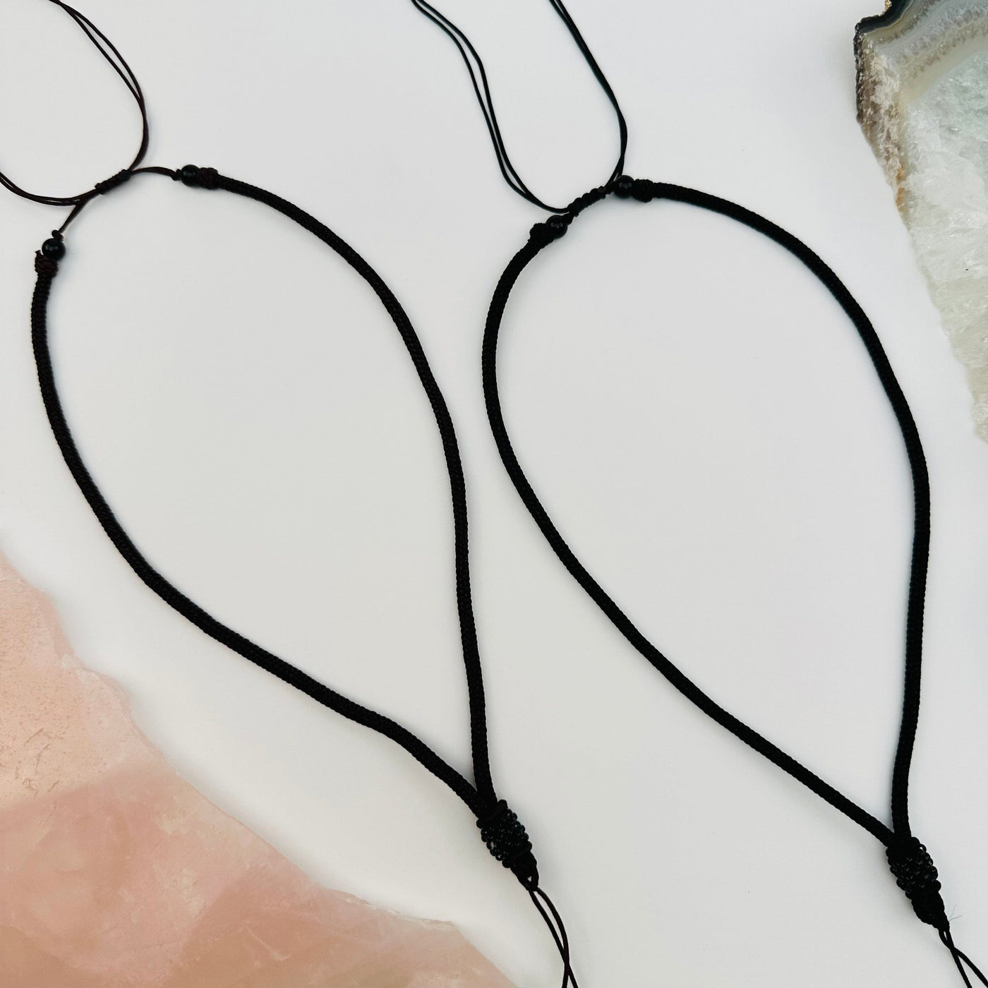 necklaces displayed to show that they are adjustable 