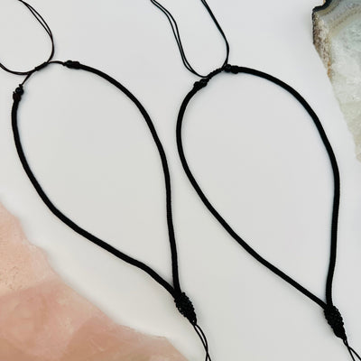 necklaces displayed to show that they are adjustable 