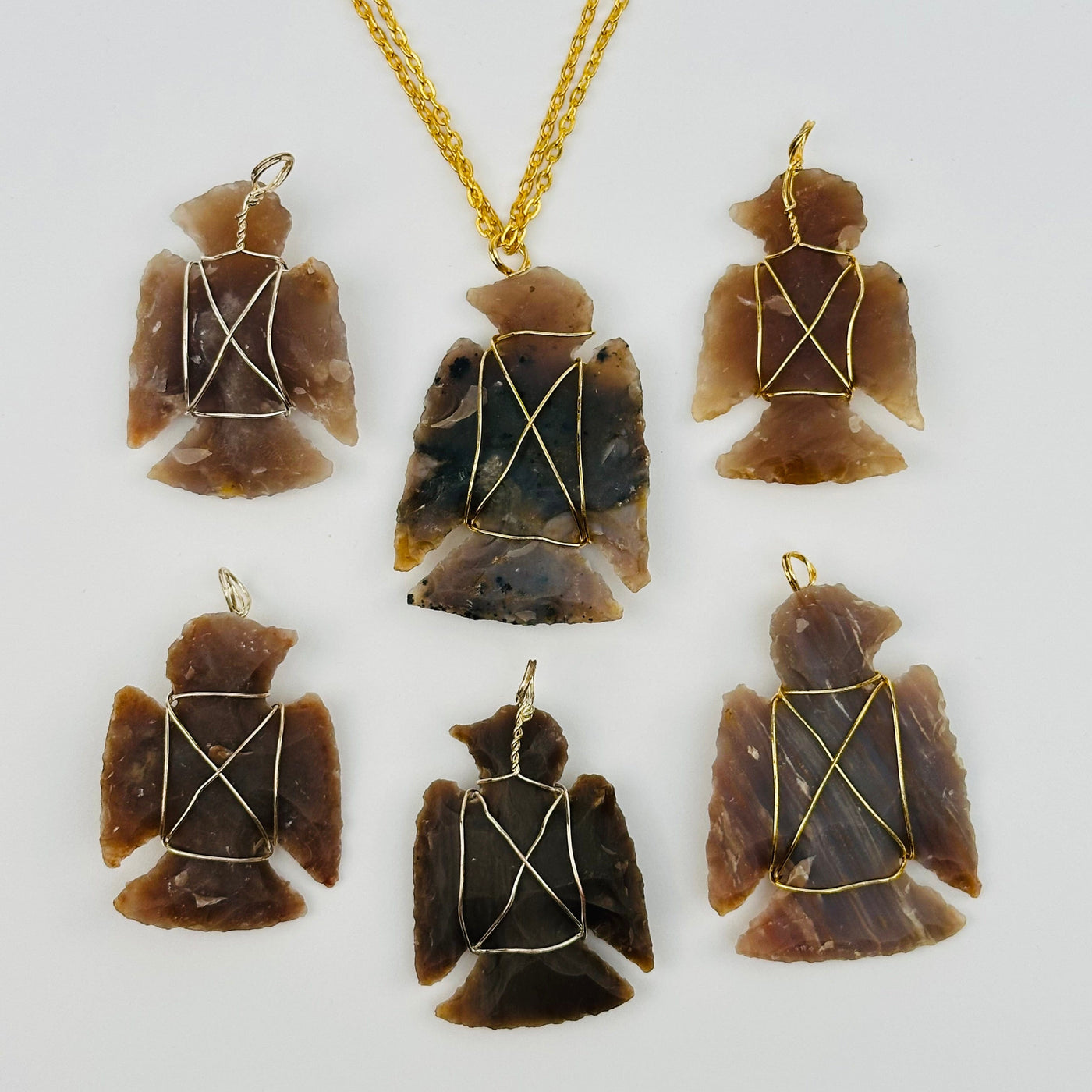 multiple pendants displayed to show the differences in the sizes and color shades 