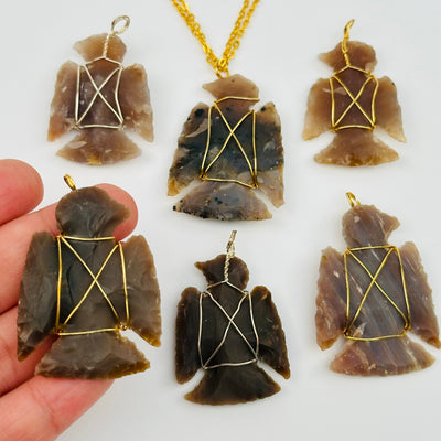 Wire Wrapped Jasper Eagle Arrowhead Pendant on hand for size reference 