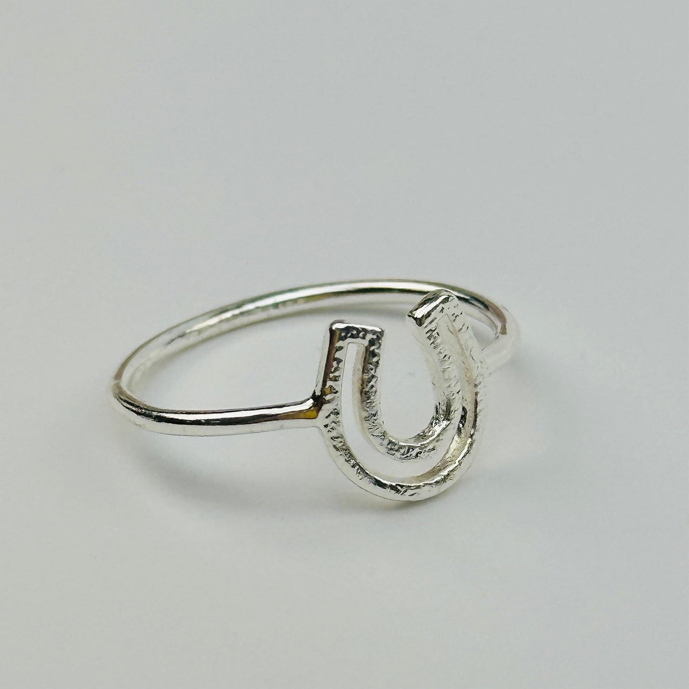 close up of the details on these horse show rings. available in silver tone