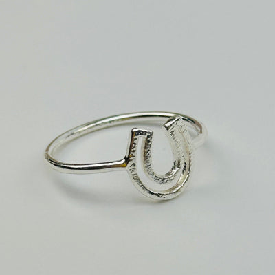 close up of the details on these horse show rings. available in silver tone