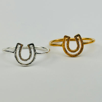 close up of the details on these horse shoe rings
