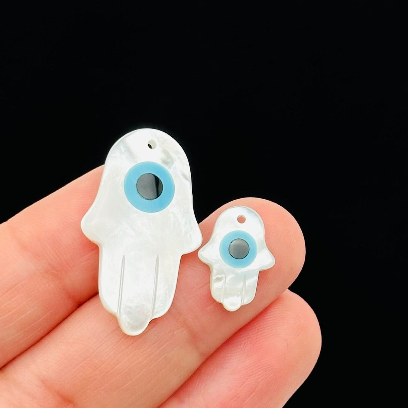 close up of the details on these hamsa hands 