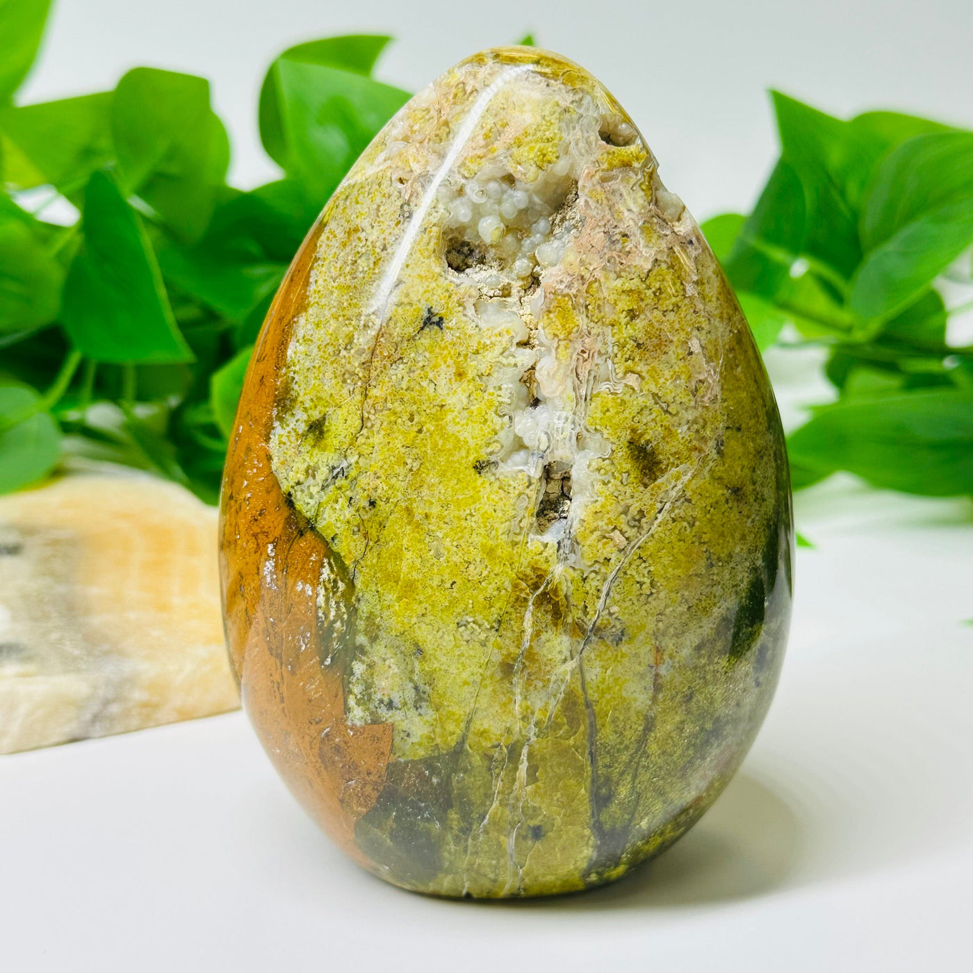 Pistachio Green Opal Crystal Polished Cut Base displayed as home decor 