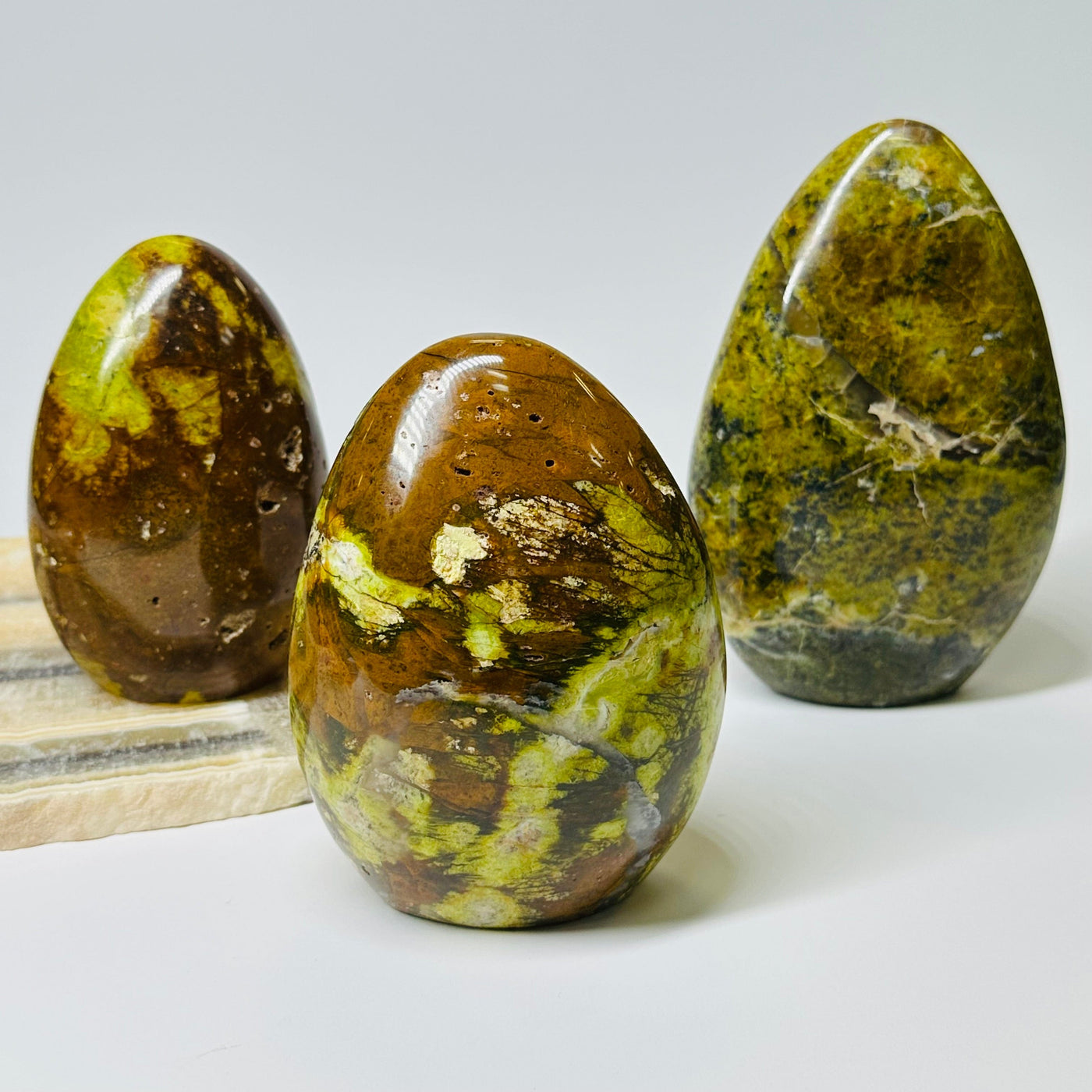 Pistachio Green Opal Crystal Polished Cut Bases displayed as home decor 