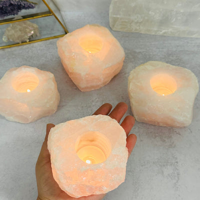  Rose Quartz Candle Holder in hand for size reference 