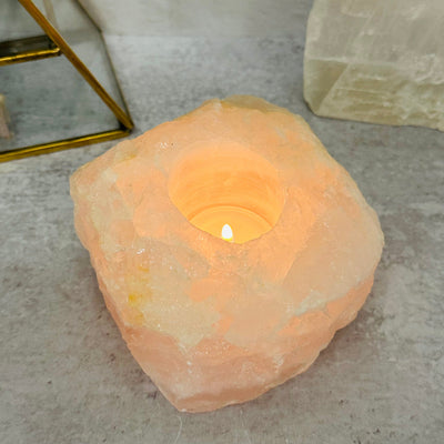 rose quartz candle holder displayed as home decor 