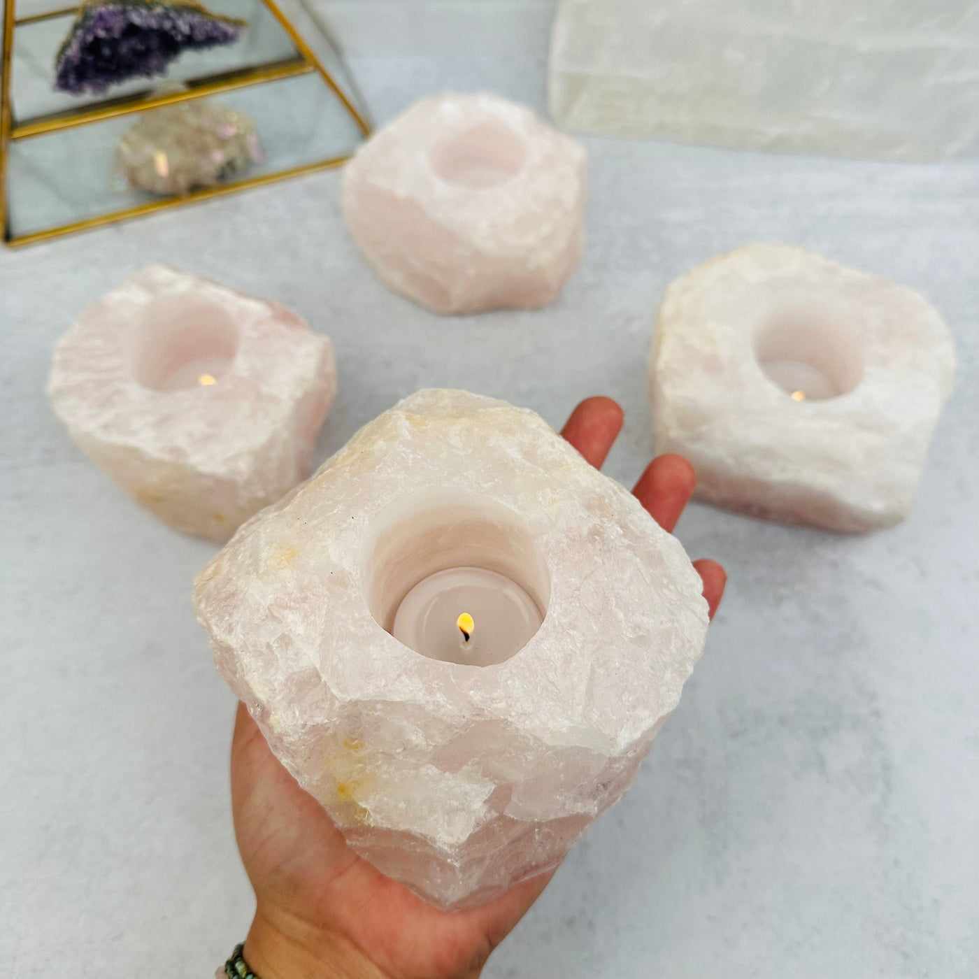  Rose Quartz Candle Holder in hand for size reference 