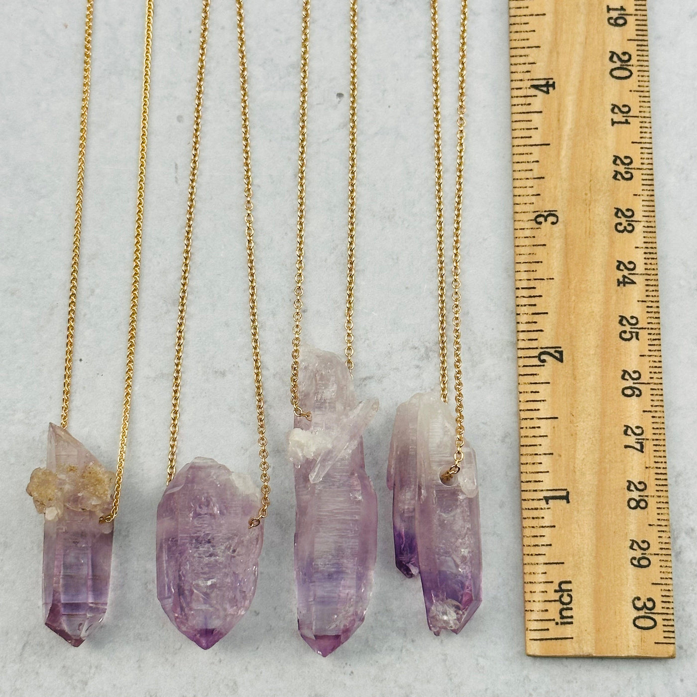 Veracruz amethyst next to a ruler for size reference 