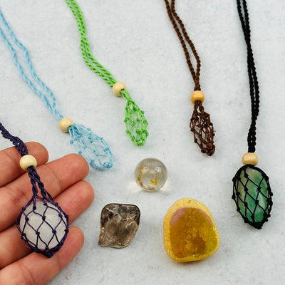 add any small crystal to the netting necklace 