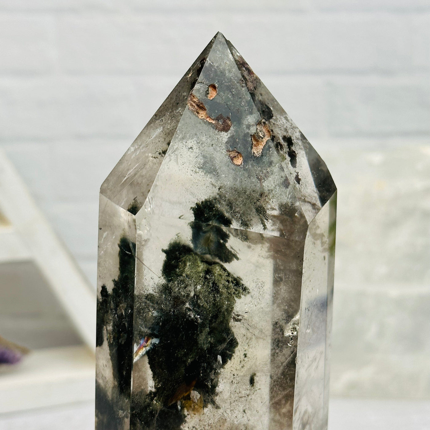 this lodolite point comes with natural inclusions 