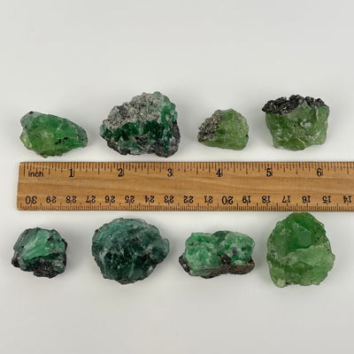 fluorite with galena crystal clusters displayed next to a ruler for size reference 