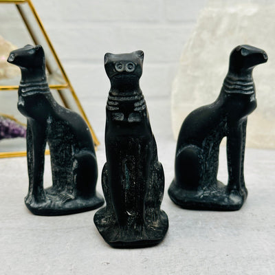front and side view of these hand carved cats 