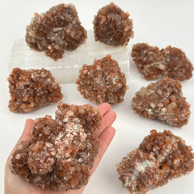 Natural Aragonite Crystal Cluster - By weight in hand for size reference 
