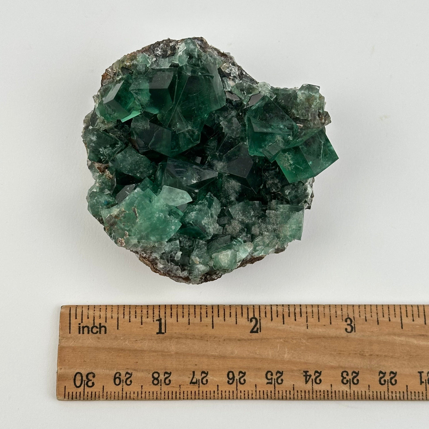  Cubic Fluorite Crystal Cluster - High Grade Formation - displayed next to a ruler for size reference 