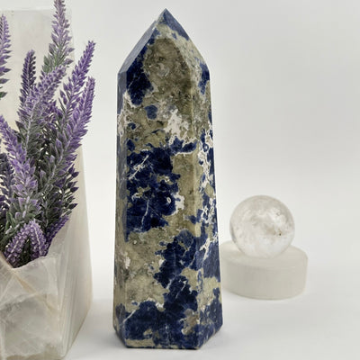  Sodalite Polished Crystal Point displayed as home decor 