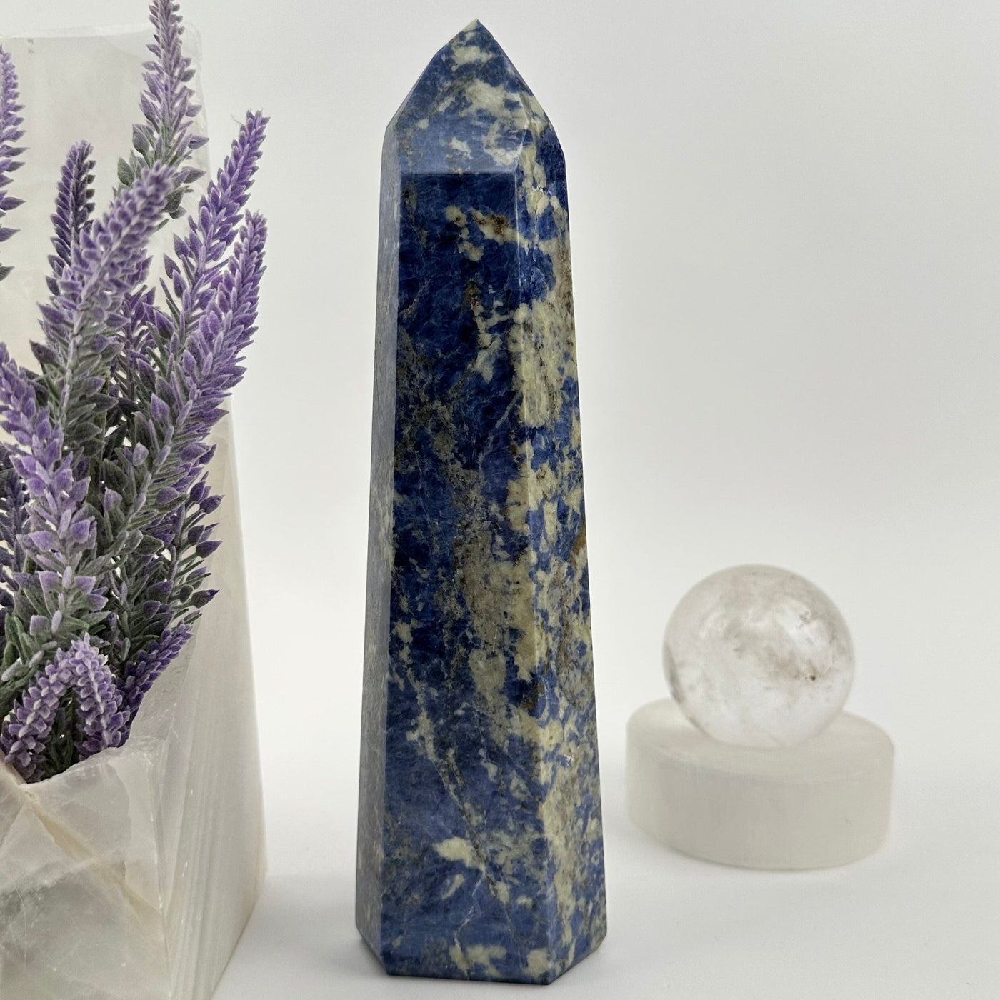  Sodalite Polished Crystal Point displayed as home decor