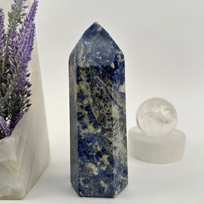  Sodalite Polished Crystal Point displayed as home decor 