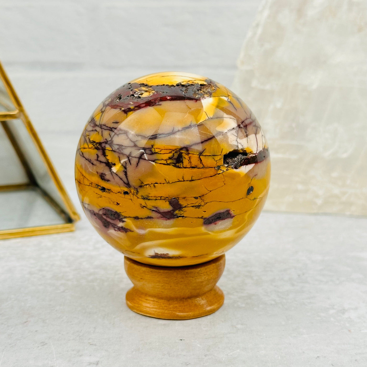 Mookaite Polished Sphere displayed as home decor