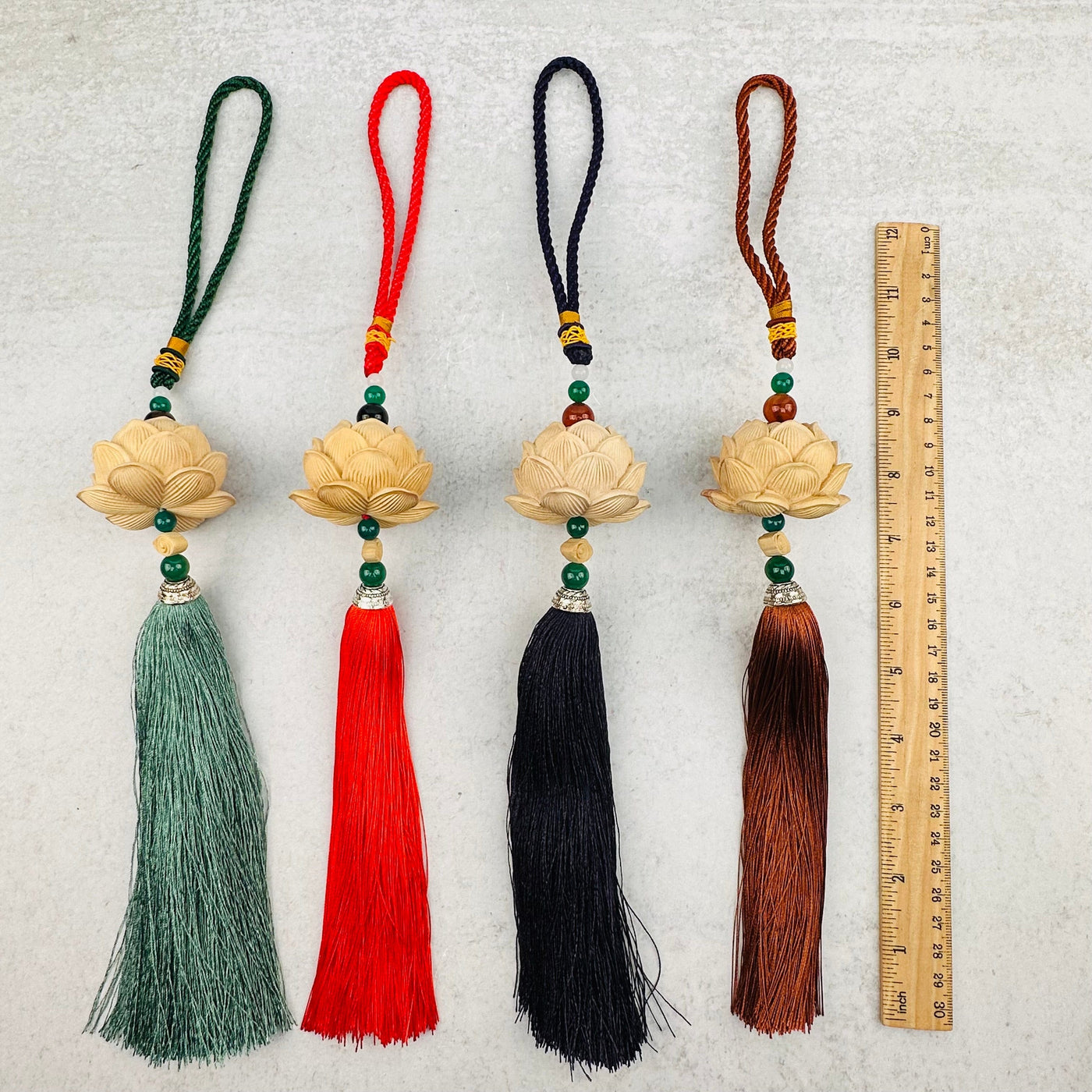 wooden lotus flower tassel with decorations in the background