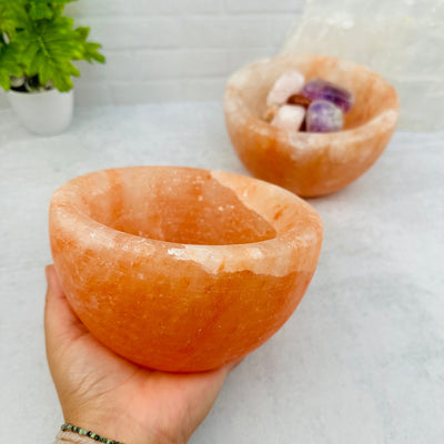 Himalayan Salt Bowl in hand for size reference 