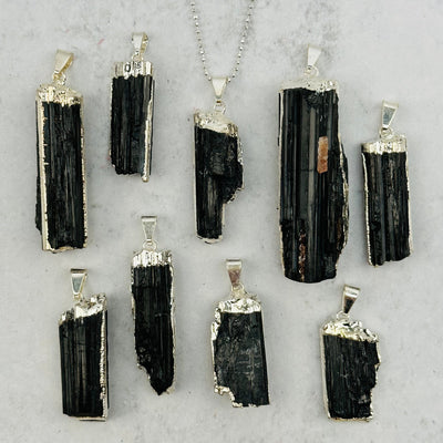 multiple pendants displayed to show the differences in the sizes available 