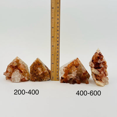 Tangerine Quartz Cluster Semi Polished Point - By Weight - next to a ruler for size reference