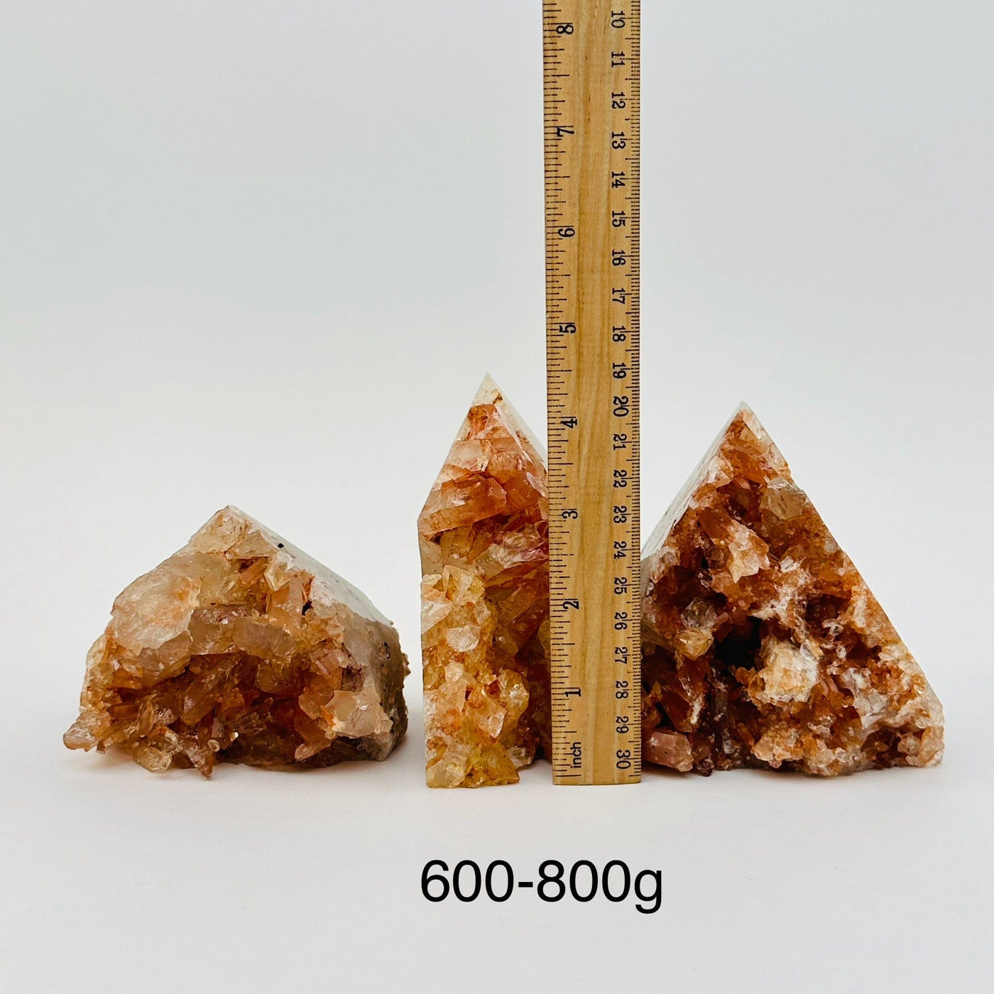 Tangerine Quartz Cluster Semi Polished Point - By Weight - next to a ruler for size reference