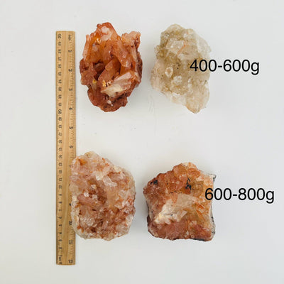 Tangerine Quartz Clusters - By Weight - next to a ruler for size reference