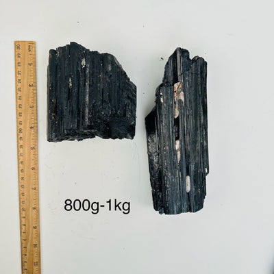 Natural Black Tourmaline - By Weight - next to a ruler for size reference