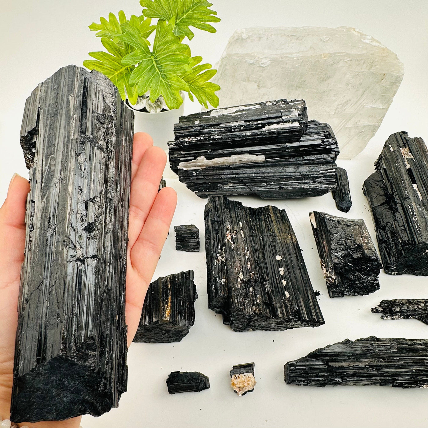 Natural Black Tourmaline - By Weight - in hand for size reference 