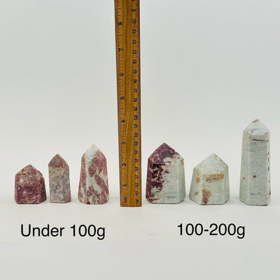 Polished Pink Tourmaline on Matrix Crystal Point - By Weight - next to a ruler for size reference 