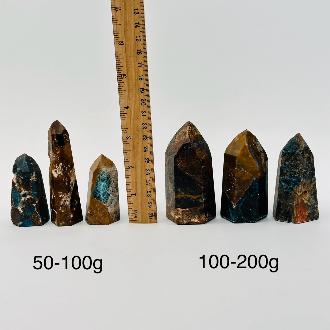 Apatite on Lions Eye Jasper Polished Crystal Point - By Weight - next to a ruler for size reference 