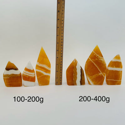 Banded Orange Calcite Crystal Point - By Weight -