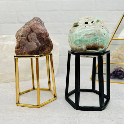 Crystal Stand Hexagon Shape in Brass and Black Aluminum displayed as home decor