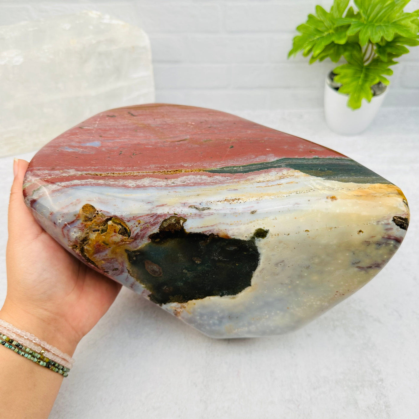  Ocean Jasper Large Tumbled Stone in hand for size reference 