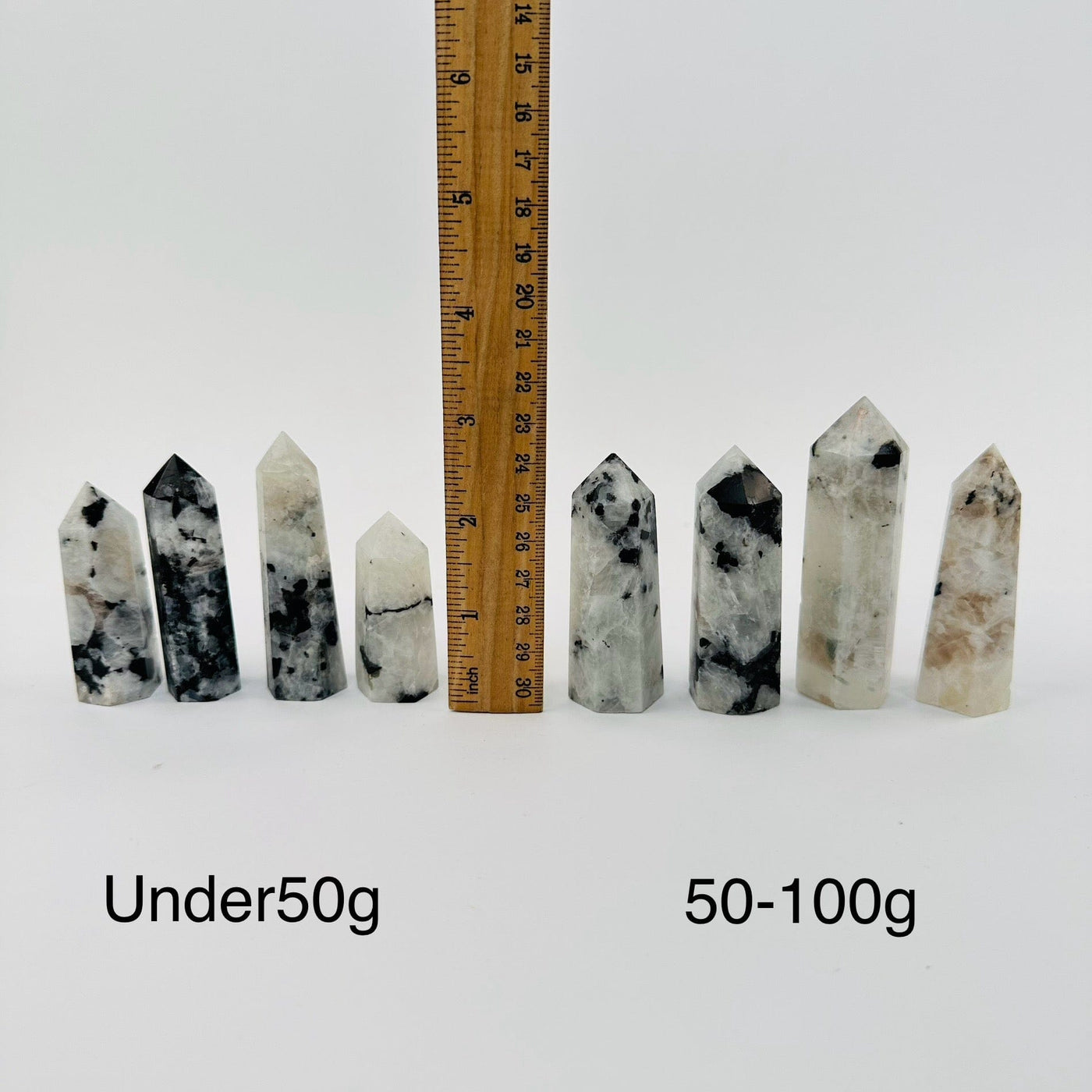 Rainbow Moonstone Polished Crystal Points - By Weight - next to a ruler for size reference 