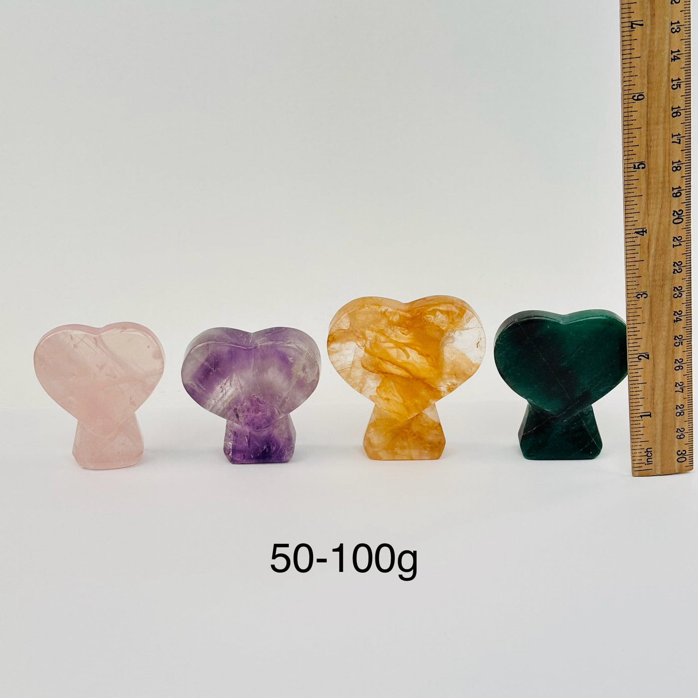 Crystal Hearts with Stand by weight - next to a ruler for size reference 