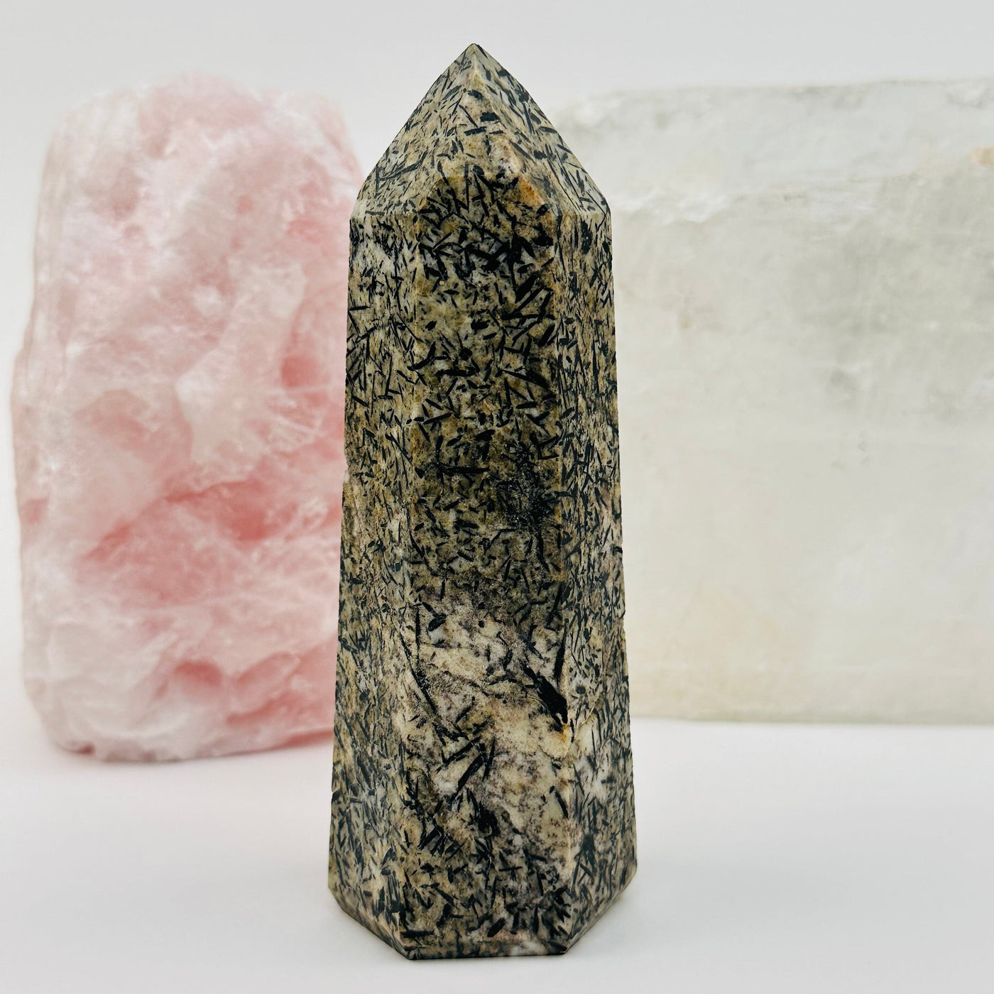 Epidote Polished Crystal Point displayed as home decor 