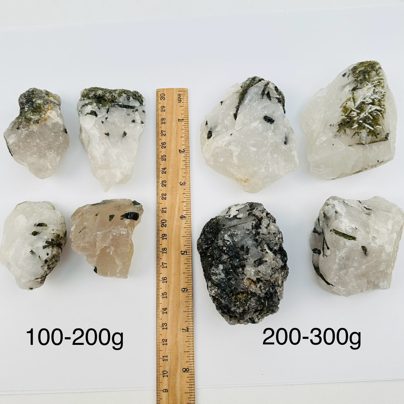 Green Tourmaline Rough Crystal on Matrix by weight - next to a ruler for size reference 