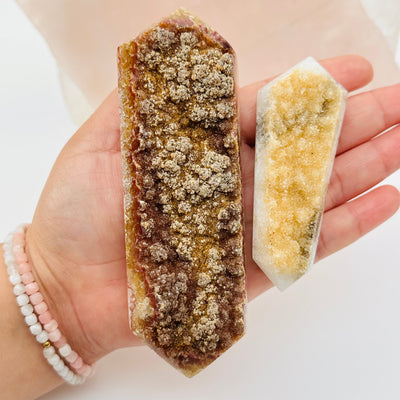 Double Terminated Citrine Crystal Points in hand for size reference 