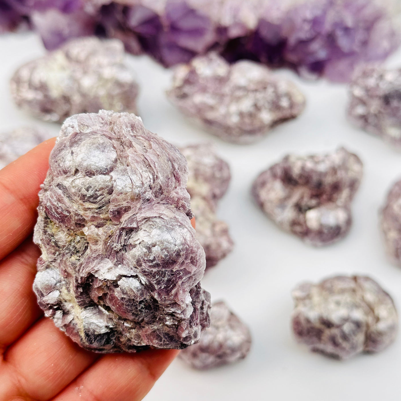 Botryoidal Lepidolite Crystal Cluster in hand for size reference 