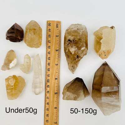 Natural Citrine with Smokey Quartz Crystal by weight - next to a ruler for size reference 