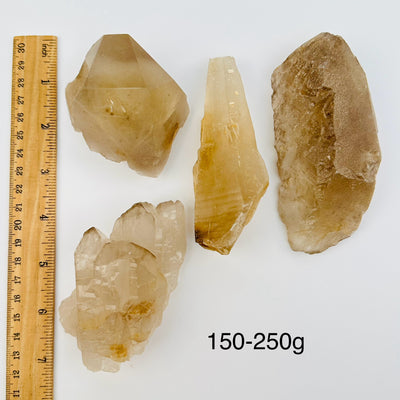 Natural Citrine with Smokey Quartz Crystal by weight - next to a ruler for size reference