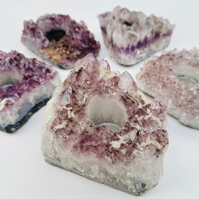 close up of the details on these amethyst candle holders 