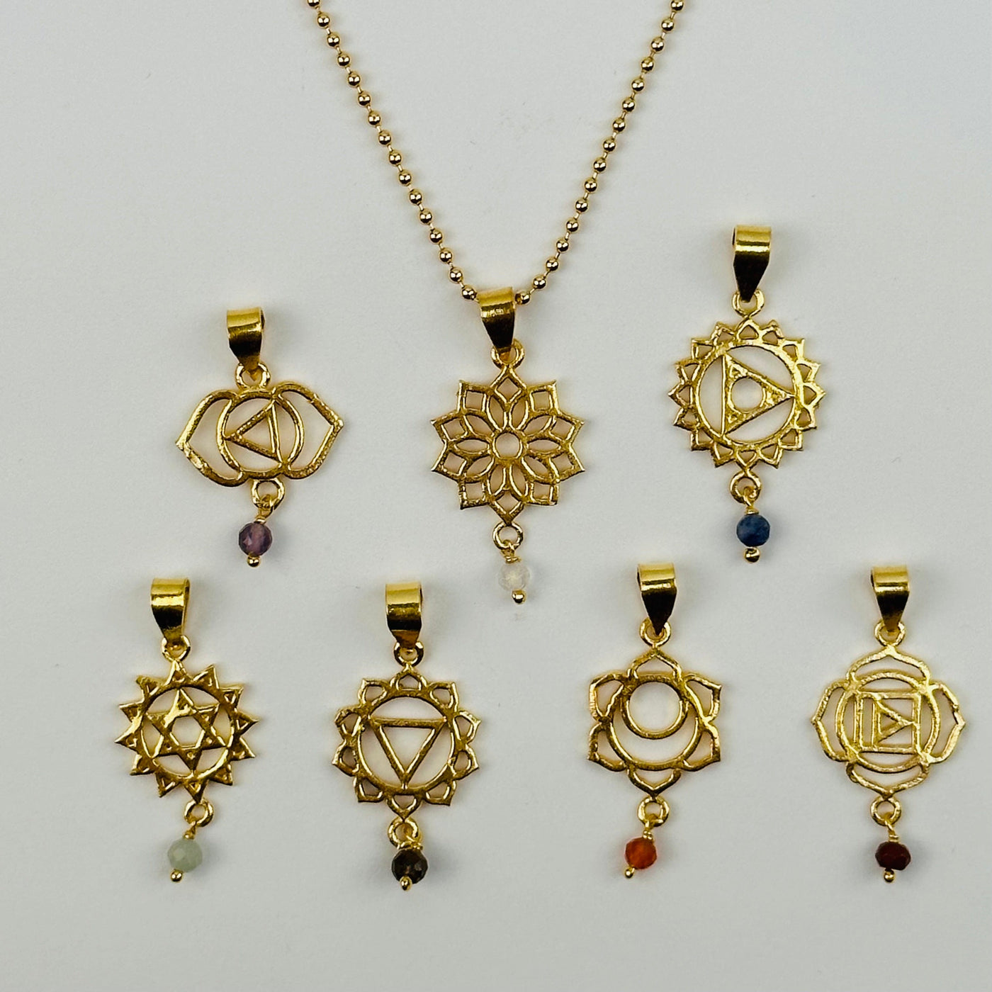 each chakra has a gemstone bead on it